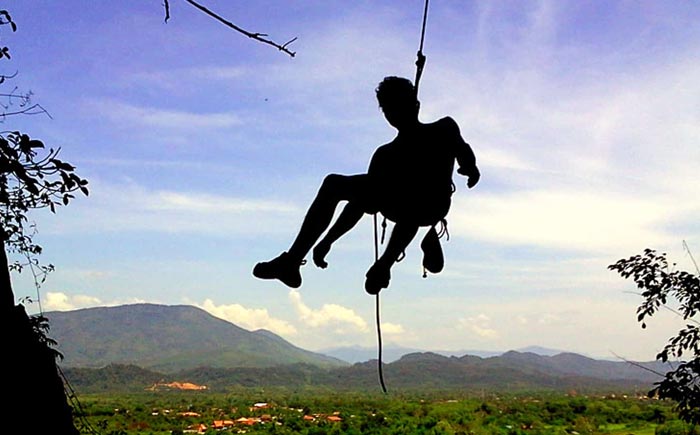 A rock climber in Vang Vieng