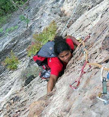 Adam climbing in Vang Vieng